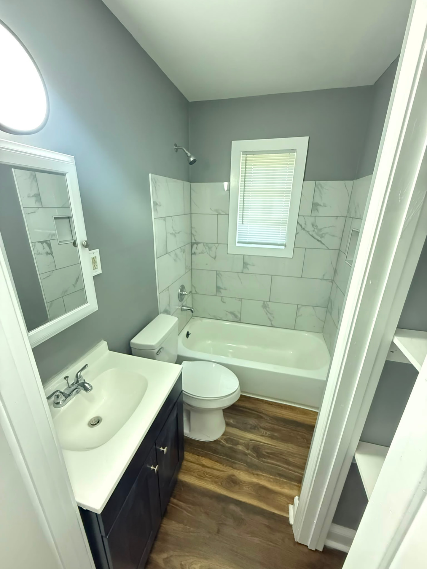 Bathroom with white vanity at 962 Inman Rd