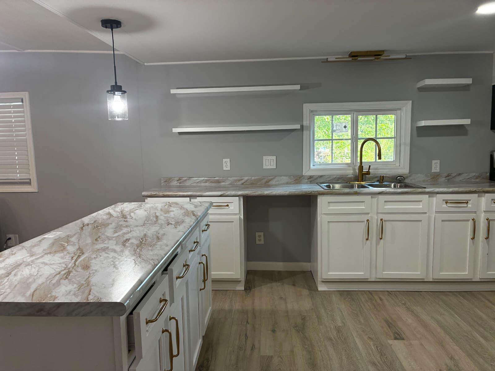 Kitchen with white cabinets at 151 Fleetwood Dr