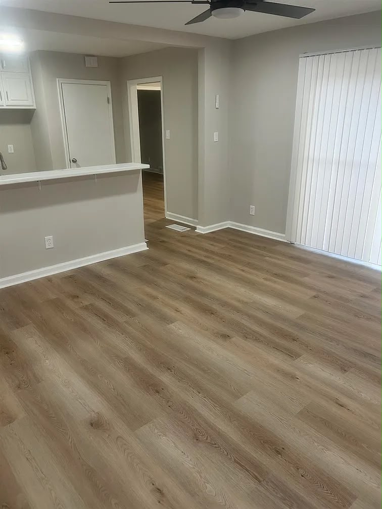 Open living and dining area at 2805 W Lake Shore Dr