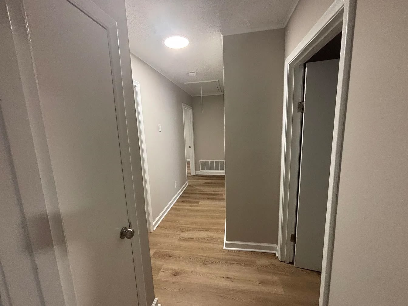 Hallway with wood flooring at 2805 W Lake Shore Dr