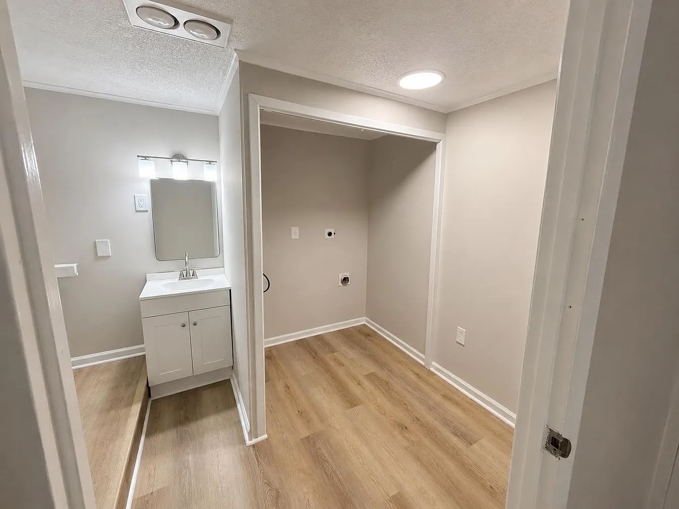 Vanity and laundry area at 2805 W Lake Shore Dr
