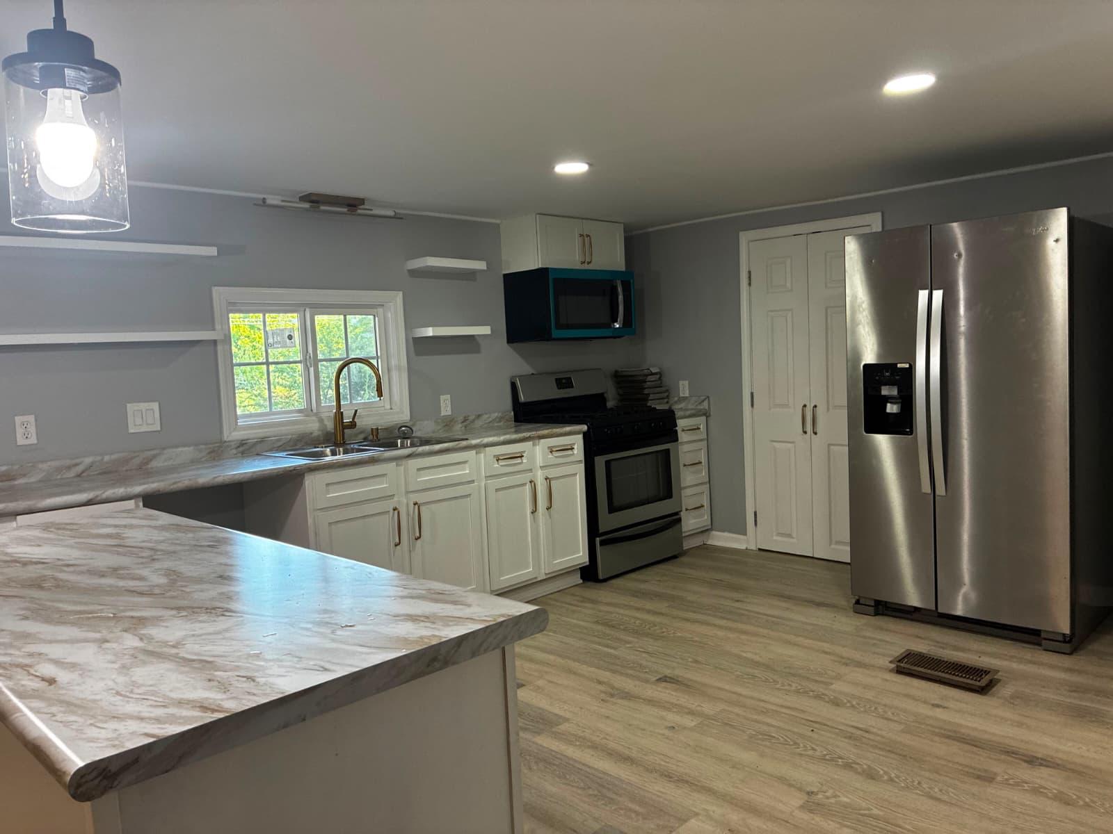 Kitchen with refrigerator and stove at 151 Fleetwood Dr